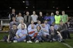 Representatives of Wintercomfort and YMCA teams with officials after the presentation.